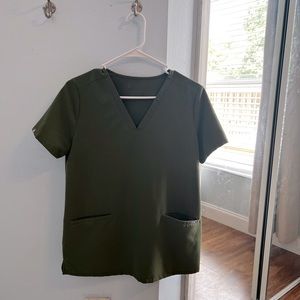 Size small olive-colored Figs scrub top with pockets. Like-new condition